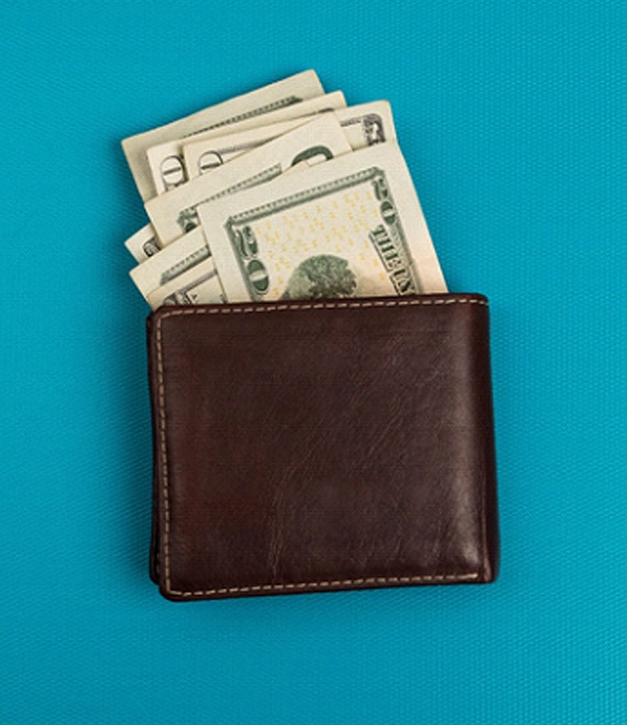 Wallet of money for cost of Invisalign in Panama City