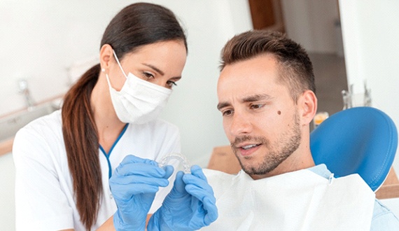 Man at dentist getting Invisalign in Panama City