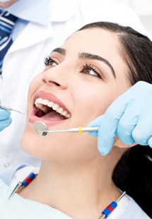 patient visiting dentist for checkup 